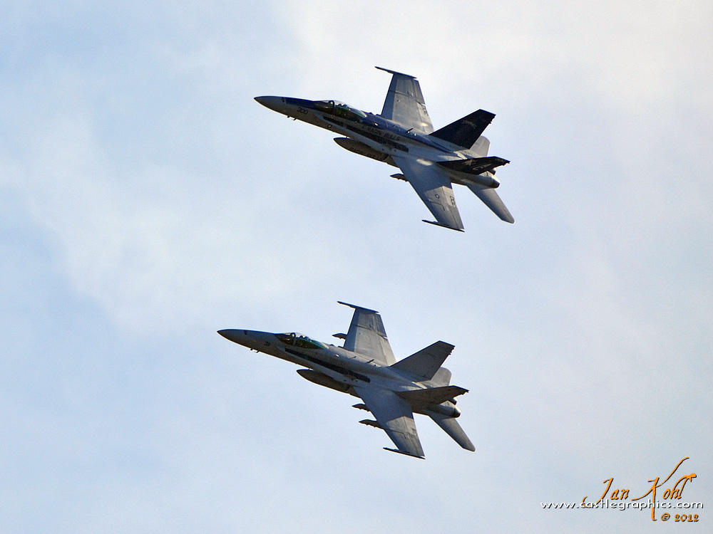 Rolex 24, Saturday: Stirring up the Hornets
Two Navy F/A-18s kick off the festivities with a flyover.  Interestingly enough...just one engine in the F-18 has the same approximate horsepower as the entire 2012 field of Daytona Prototypes (14).
Keywords: 2012 Rolex 24