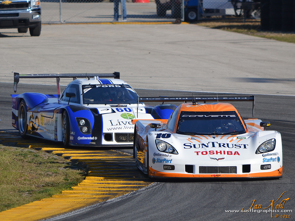 Rolex 24, Saturday: DP racing
A brief appearance of the SunTrust Corvette as it leads the #60 Michael Shank Racing Ford/Riley.  After 14 laps the Corvette expired.  The #60 lasted a lot longer.
Keywords: 2012 Rolex 24