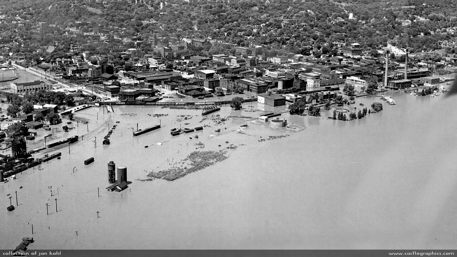 Aerial shot of Hannibal flooding
Photo from an aircraft of the Mississippi flooding of Hannibal in 1946.  Most of the CB&Q yard is completely under water (left and lower left) while the rest of the town fairs a little better.
