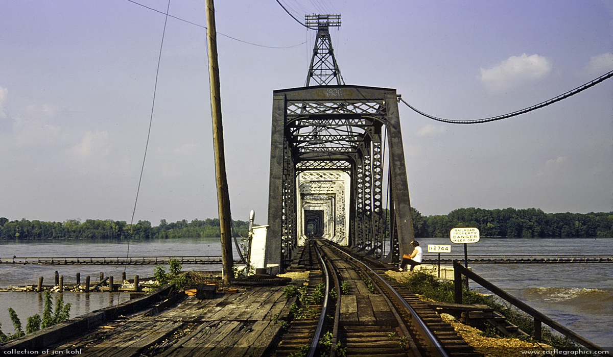 IC Swing Bridge, Louisiana, MO, 1976
A view of the venerable swing bridge crossing the Mississippi.  An operator sits in the bridge all day and opens the span when river traffic approaches.  It was still this way in 2012.
