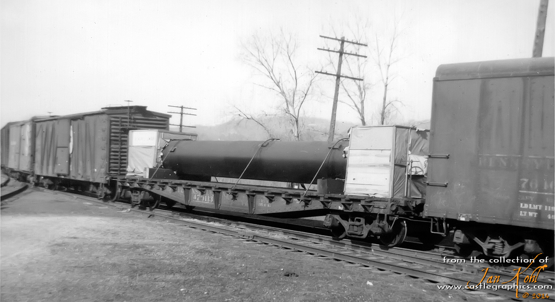 PRR flatcar with load on transfer track...
PRR flatcar being tranferred between the CB&Q and GM&O.
