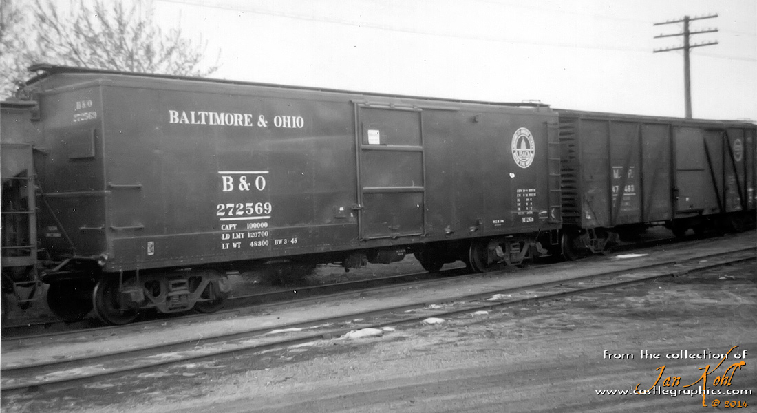 B&O and MP boxcars in Louisiana, MO
From Bill Hirt: The B&O car is a repaint, series 271500-272499 	XM. 40' Steel 1923 ARA Proposed Standard Box w/6' Door Opening. ARA Car Builder Sliding Door. Class M-26c. Built 1928 by Baltimore Car & Foundry. IH 8' 7". Series #271500-272499. Photo in B&O Color Guide on p63. Photos in Railway Prototype Cyclopedia Volume 18 on p64 p73 & p75.

The MP car is from MP series 47000-47999 built 1925 by ACF. These cars were rebuilt by MP to steel boxcars in the same series in the early 1950s.
