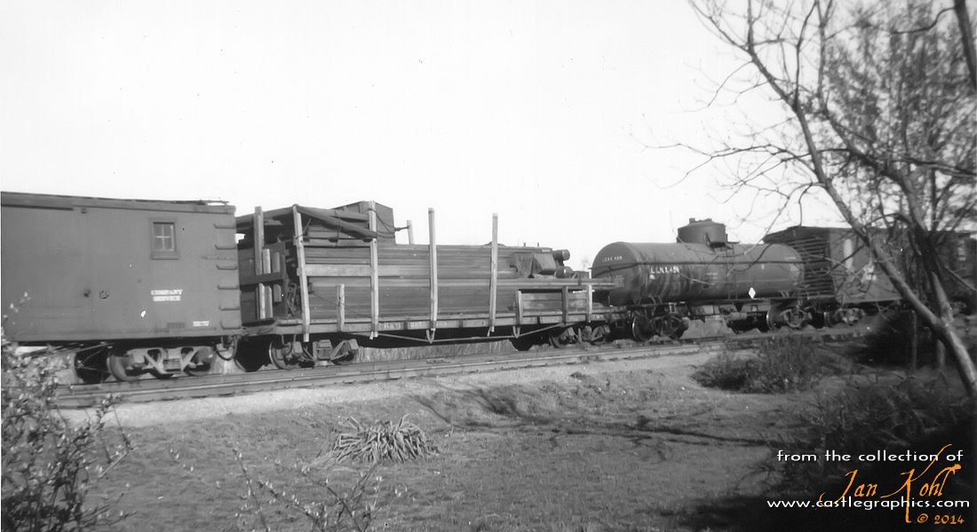 CB&Q MoW train
A CB&Q flatcar with a load of lumber is part of a CB&Q MoW work train in Louisiana, MO.

