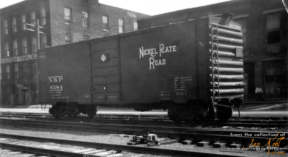 Nickel Plate boxcar on CB&Q track.
A Nickel Plate boxcar sits on the CB&Q track in Louisiana, MO.  From Bill Hirt: NKP Boxcar XM. 40' PS-1 Box w/6' Door Opening. Superior Sliding Door. Built 1948 by P-S. 12 Panel Sides. Series #6000-6599. Renumbered N&W 206000-206599. Photo in Wabash/Nickel Plate/DT&I Color Guide on p63.
