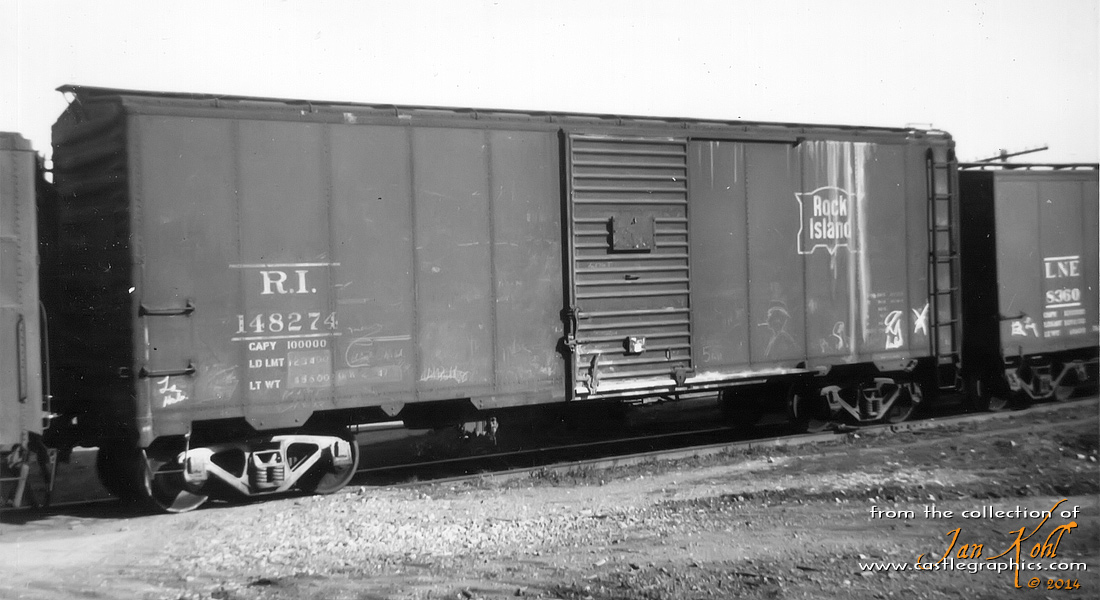 Rock Island boxcar...
A nice shot of a vintage 40' Rock Island boxcar in Louisiana, MO. From Bill Hirt: RI boxcar XM. 40' 1937 AAR Modified Box w/6' Door Opening. Youngstown Sliding Door. Built 1942 by PSC. IH 10' 6". Series #147750-148549. Photo in RI Color Guide on p35.
L&NE boxcar XM. 40' Steel 1923 ARA Proposed Standard Box w/6' Door Opening. Youngstown Sliding Door. Built 1930-31 by Magor. IH 8' 7". Series #8201-8500. Photo in the Magor Car Corporation on p85. Photos in Railway Prototype Cyclopedia Volume 18 on p96-98.

