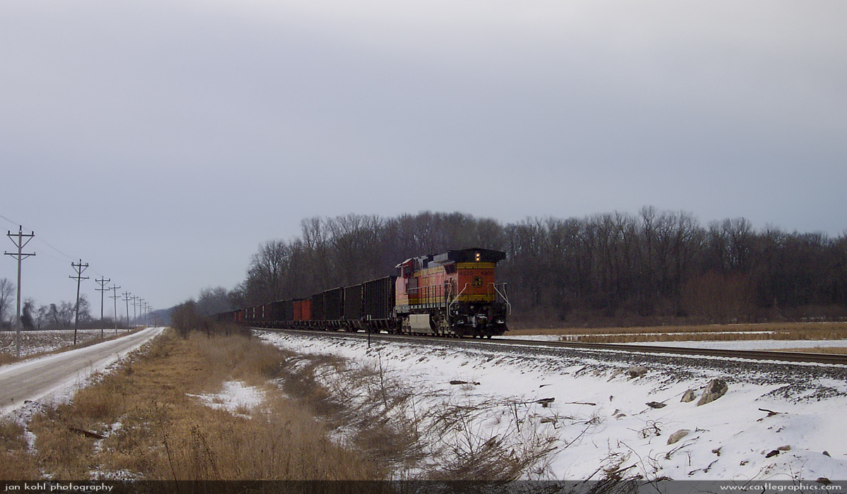 DPU brings up the rear
DPU assists the heavy coal drag on the journey south.  Most of the route is very flat due to running along the Mississippi bottoms, but there are some larger grades further north.

