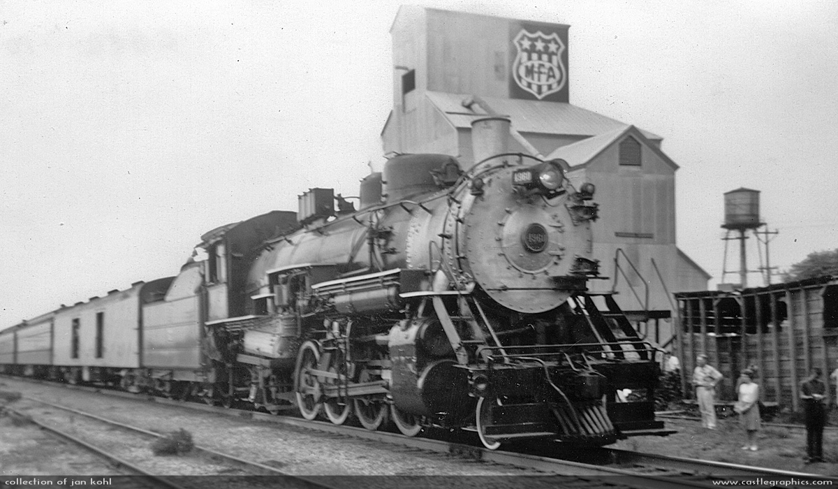 CB&Q fan trip with 2-8-2 #4960 - 1962
Northbound CB&Q Mikado sits in front of the MFA elevator in Elsberry.
