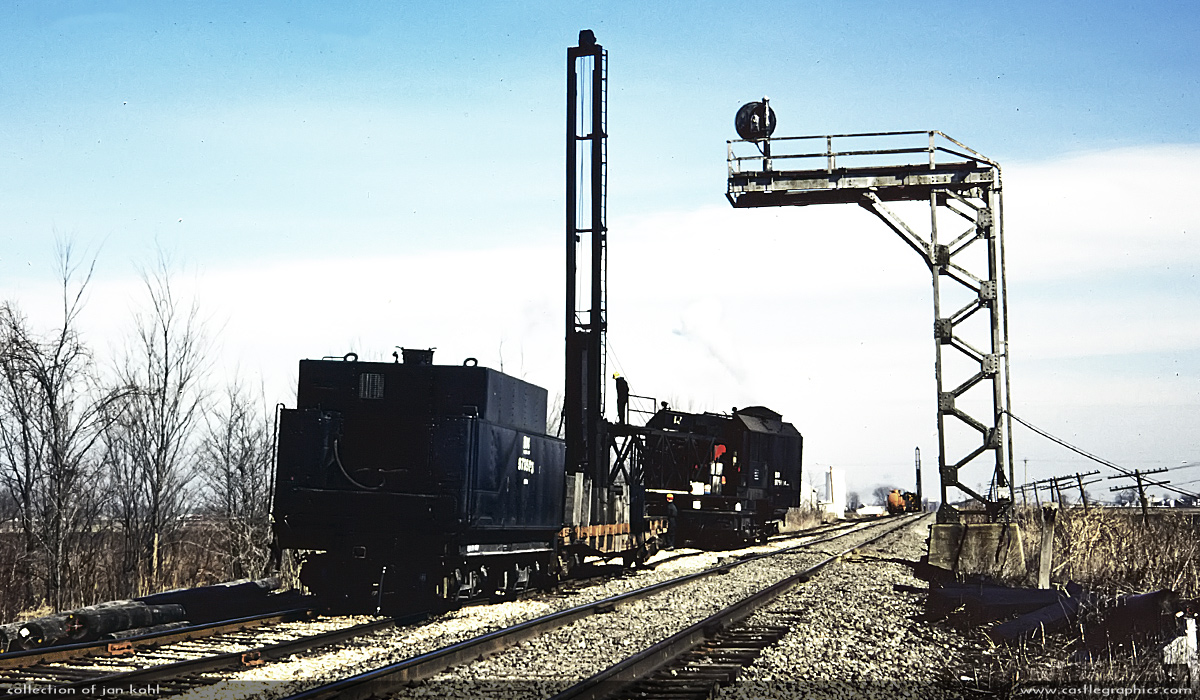 Pile driver in Seeburger
A BN pile driver and old CB&Q tender team up in winter 1976.
